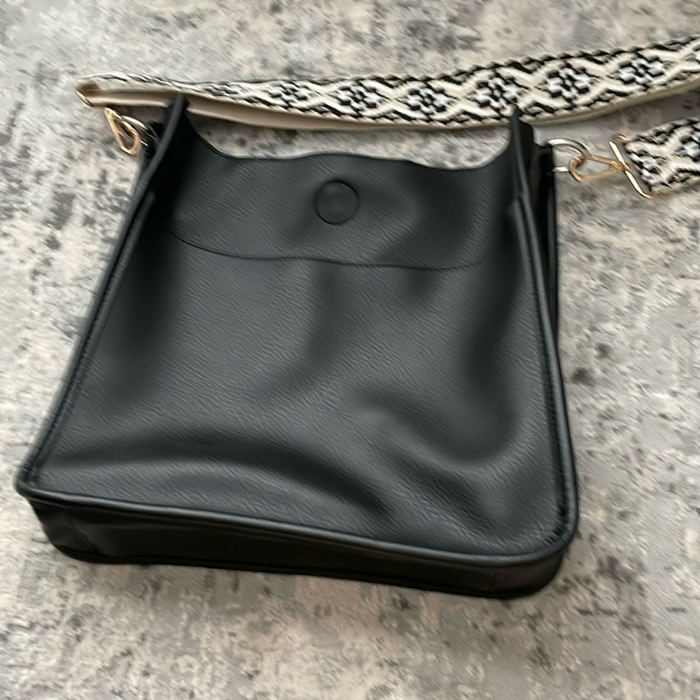 Black vegan messenger bag with guitar strap